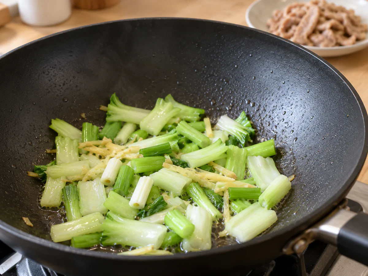 Sauté aromatics and stems